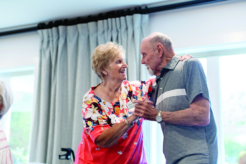 Couple dancing at the community. 