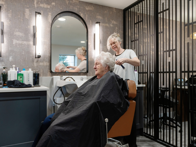 Women having her hair done at the salon.