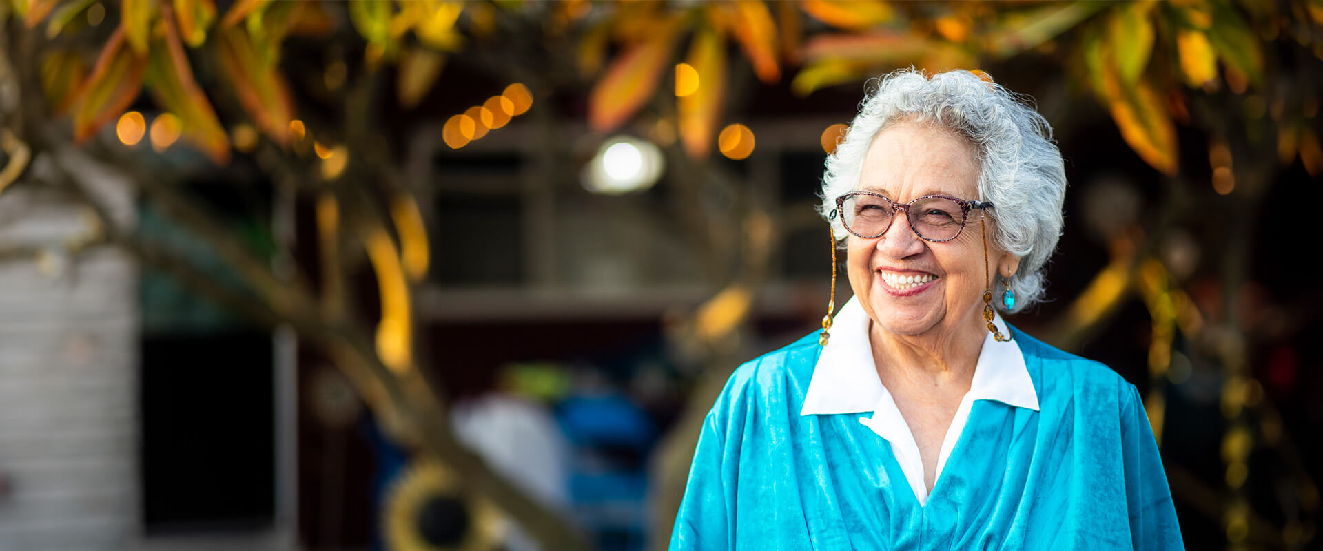 Senior woman walks on a fall day