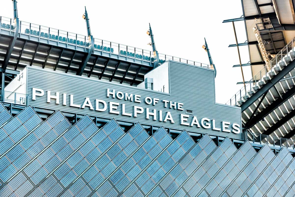 iStock-900207262-edited Philadelphia: Closeup of sign for Lincoln Financial Field stadium, home of eagles with bleachers seats